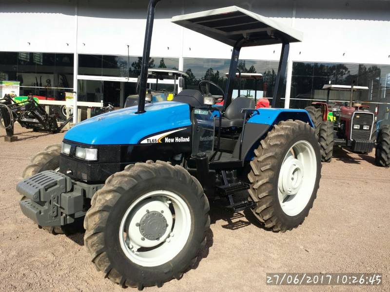 TRATOR NEW HOLLAND TL 65 - 4X4  (DIE 1213) ANO 2002- VENDIDO