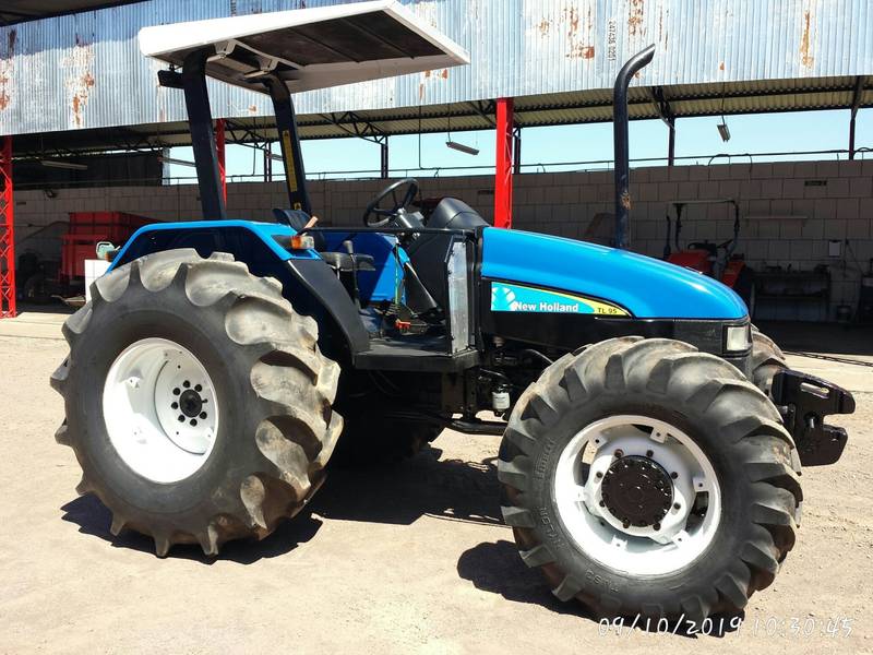 TRATOR NEW HOLLAND - TL 95 - ANO 2004 