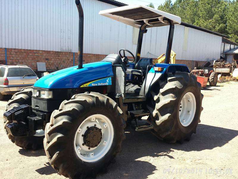 TRATOR NEW HOLLAND - TL 95 - ANO 2004 