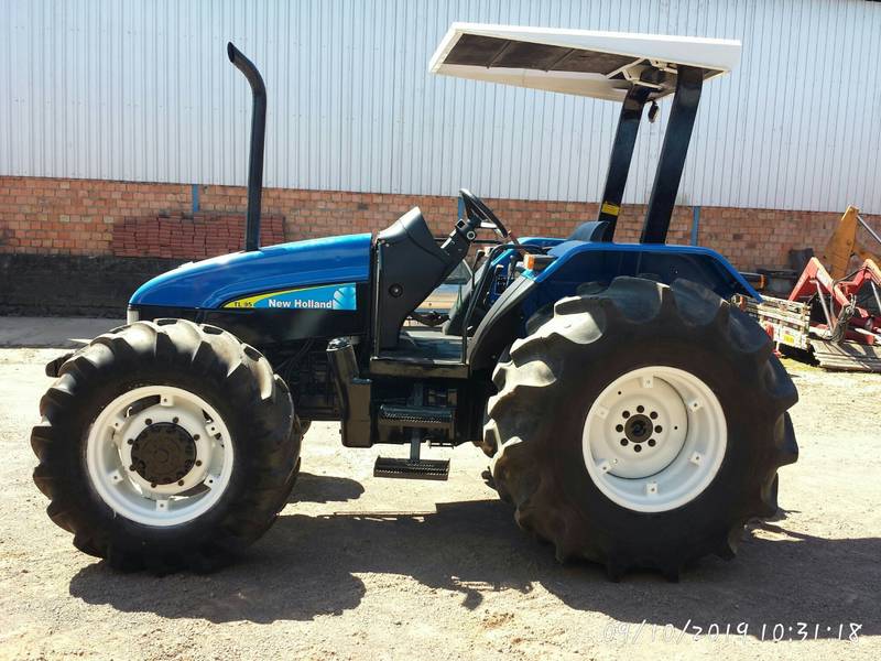 TRATOR NEW HOLLAND - TL 95 - ANO 2004 