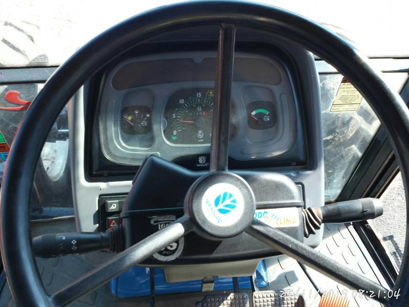 TRATOR NEW HOLLAND TL 70 4X4 - C/AR CONDICIONADO - ANO 2003 - VENDIDO