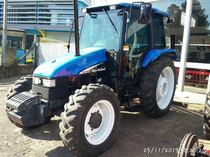 TRATOR NEW HOLLAND TL 70 4X4 - C/AR CONDICIONADO - ANO 2003 - VENDIDO