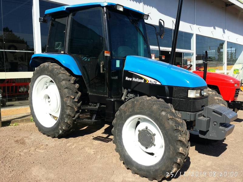 TRATOR NEW HOLLAND TL 70 4X4 - C/AR CONDICIONADO - ANO 2003 - VENDIDO