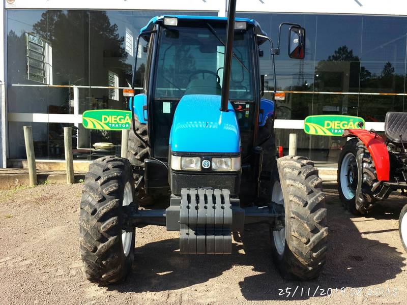 TRATOR NEW HOLLAND TL 70 4X4 - C/AR CONDICIONADO - ANO 2003 - VENDIDO