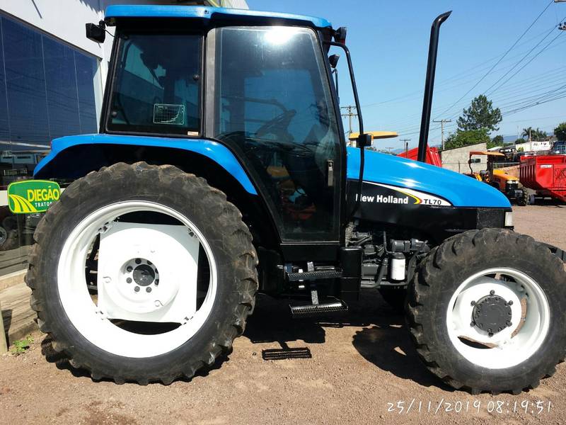 TRATOR NEW HOLLAND TL 70 4X4 - C/AR CONDICIONADO - ANO 2003 - VENDIDO